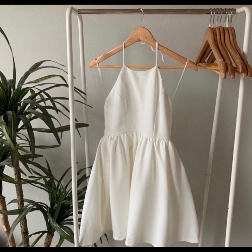 Lulu’s chic freely ivory backless skater dress